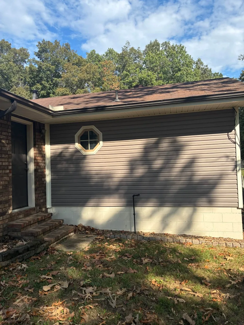 The same brown house after washing