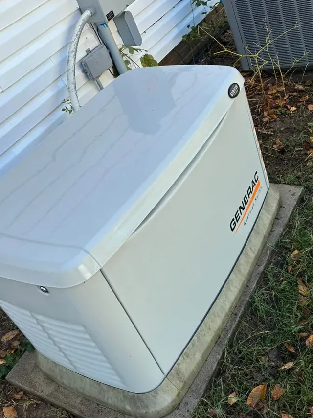 The same generator and siding washed clean